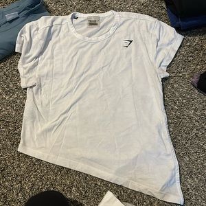 White gymshark slanted tie t shirt